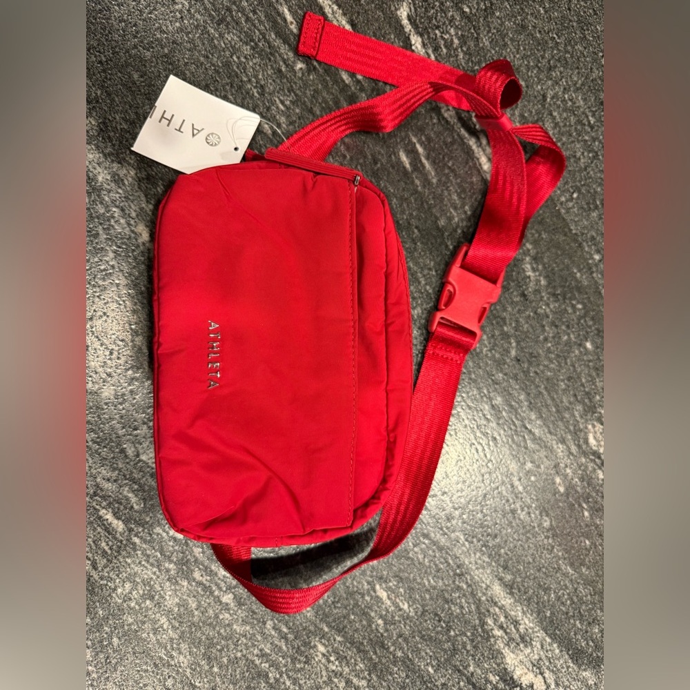 NWT- athleta all about crossbody belt bag. Brand new! Color: deep red